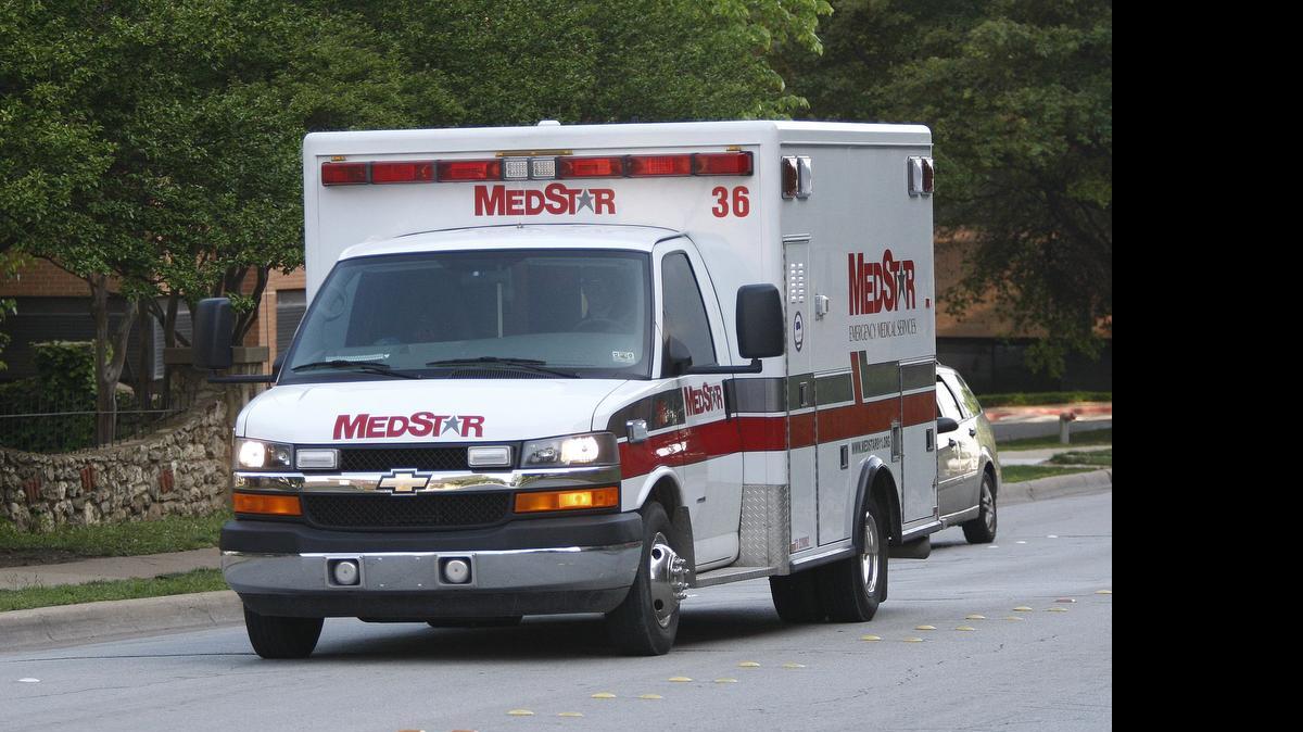 
A Medstar ambulance arrives at JPS Hospital on April 20, 2010 in this archive photo. On Thursday, June 18, 2015, an ambulance crew got more than it bargained for when it stopped on the side of the highway to help a couple. 
