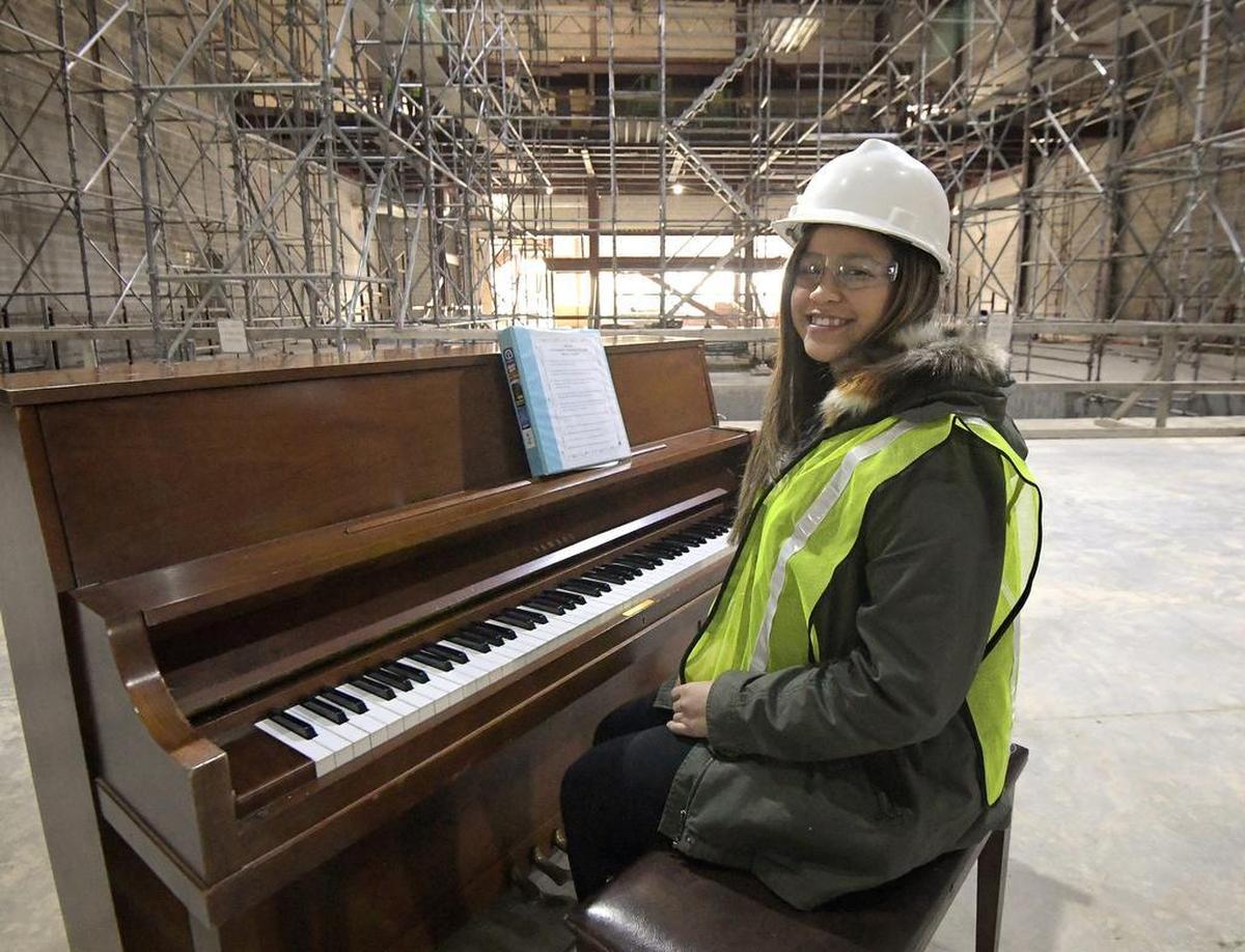 Maite Herrera, a South Hills senior, plays traveled to New York to select a Steinway piano for the new I.M. Terrell Academy.