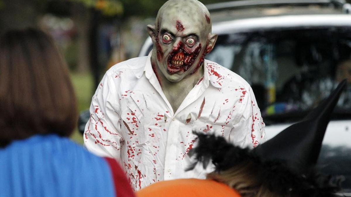 Trick-or-treaters will need raincoats or umbrellas this year in North Texas.