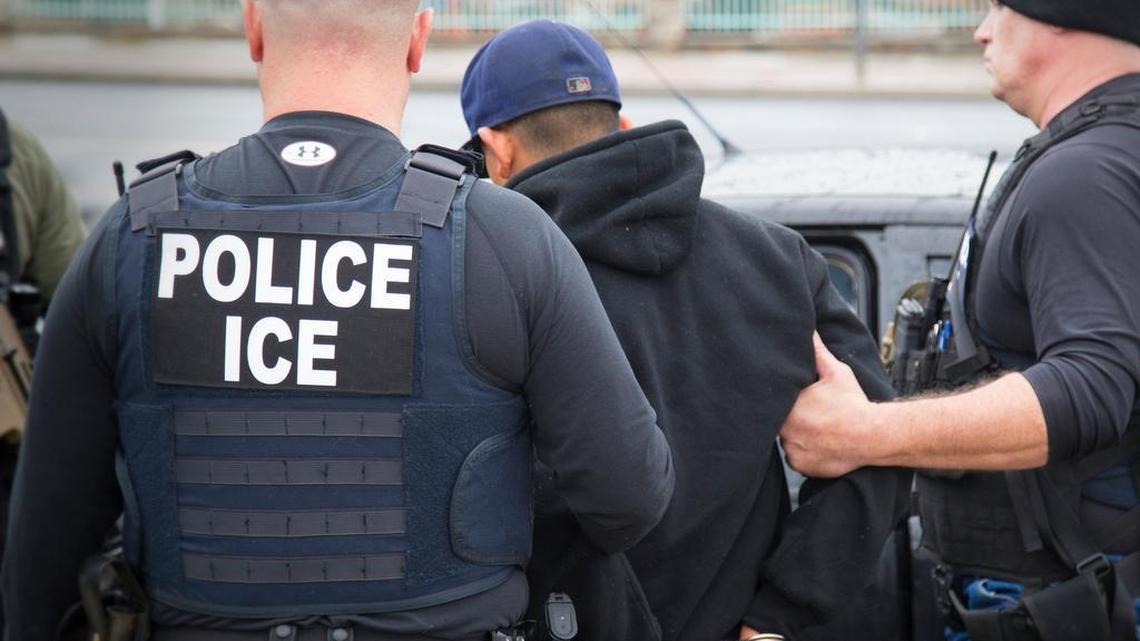 Immigration and Customs Enforcement agents make an arrest in Los Angeles in a February file photo. ICE agents detained 26 undocumented parolees reporting for community service Sunday morning at a Tarrant County facility on Cold Springs Road.