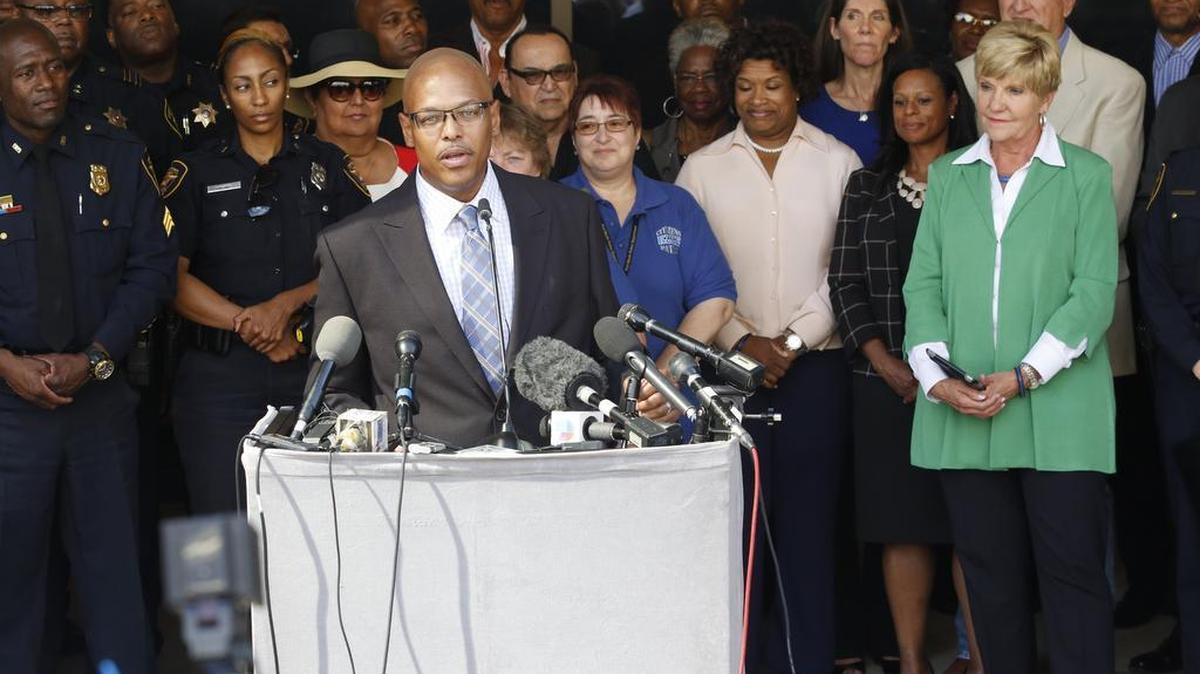 
New Fort Worth Police Chief Joel Fitzgerald speaks outside City Hall in Fort Worth Monday, Sept. 28, 2015. Mayor Betsy Price, at right in green jacket, and City Council members and civic leaders were present.
