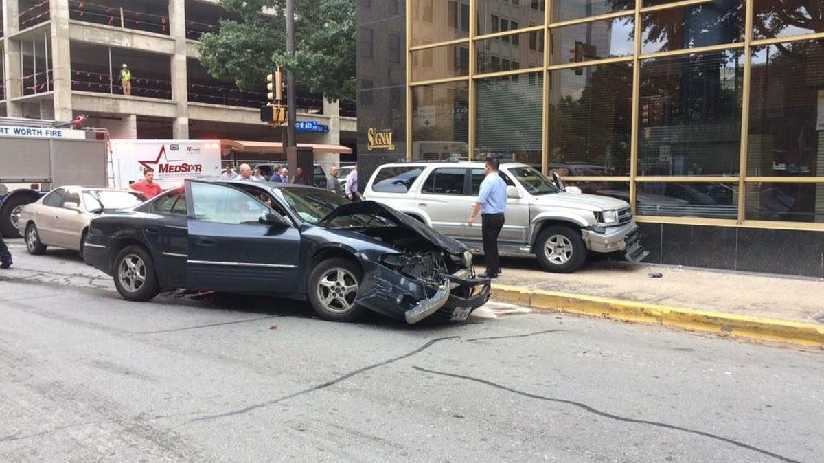 Three vehicles and some pedestrians were involved in a wreck in downtown Fort Worth on Monday morning.