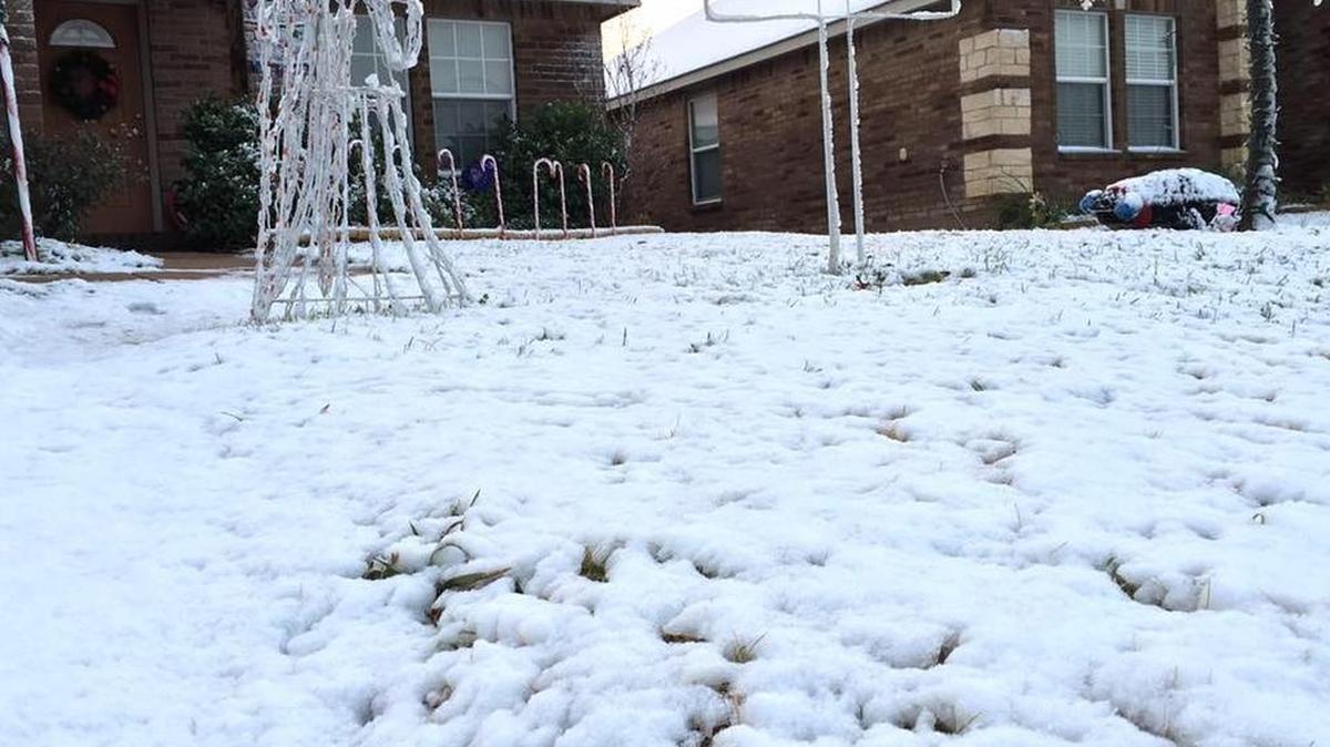 Snow covers the ground in Burleson on Monday morning.