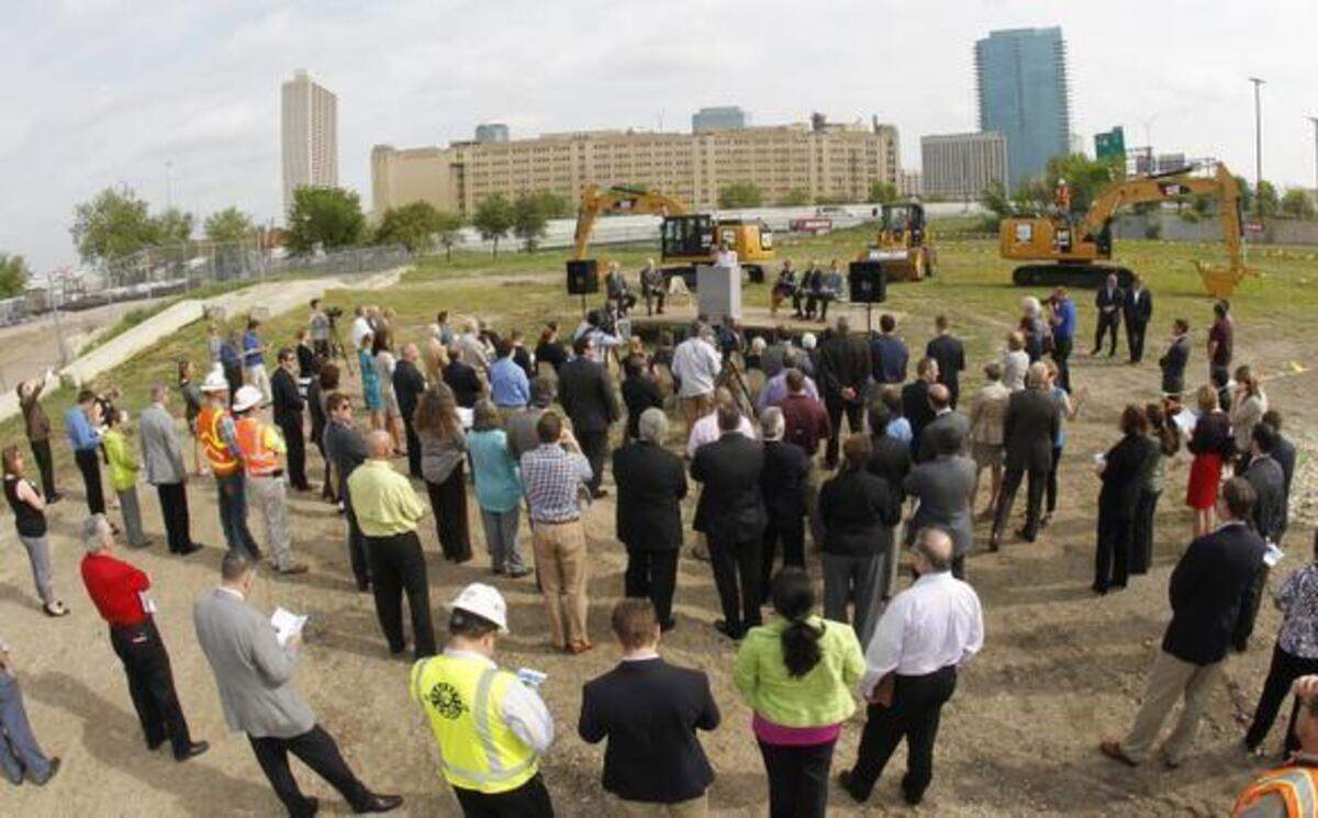 
City officials and other civic leaders gather for the groundbreaking for the Hemphill-Lamar connector Wednesday at the site along Vickery Boulevard where the near south side will get a new connection to Fort Worth’s downtown. 
