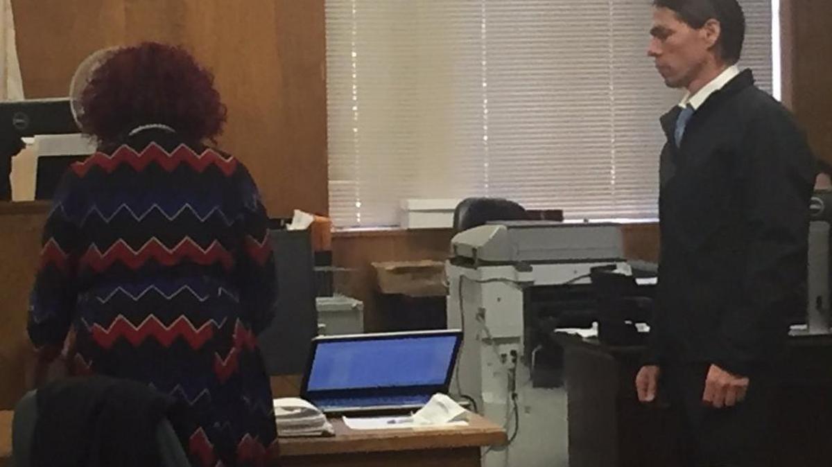 Itamar Vardi, right, stands in a courtroom at Fort Worth Municipal Court Tuesday afternoon. He is on trial for assault by offensive contact, a Class C misdemeanor, for allegedly grabbing the neck of an 8-year-old boy.