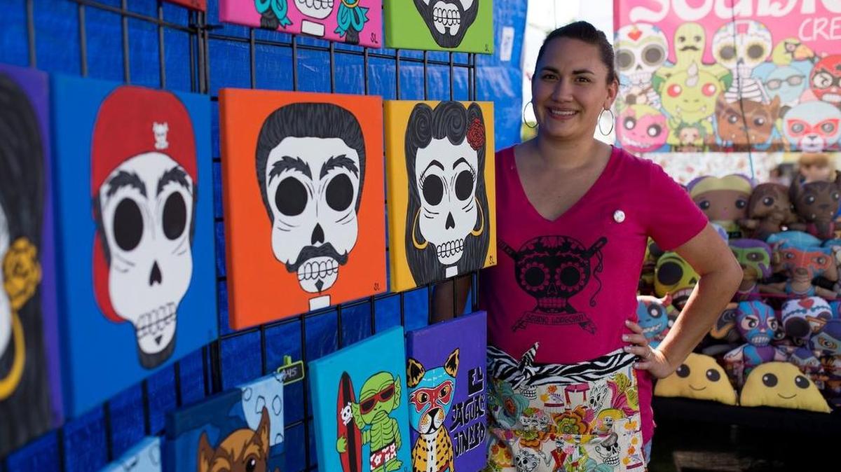 A local artist showcases her work at a previous year’s ArtsGoggle.