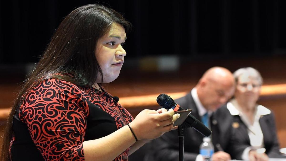 Stacey Monroe, left, a transgender woman, speaks on behalf of the Fort Worth school guidelines as Superintendent Kent Scribner and Trustee Ann Sutherland listen. Thursday, June 9, 2016, at South Hills High School.