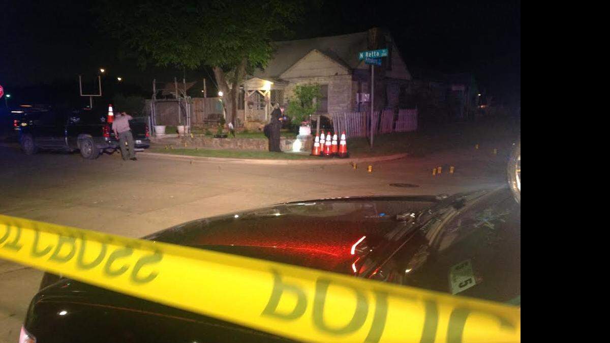 
Police collect evidence from the scene where Fort Worth patrol officers fatally shot a gunman early Wednesday.
