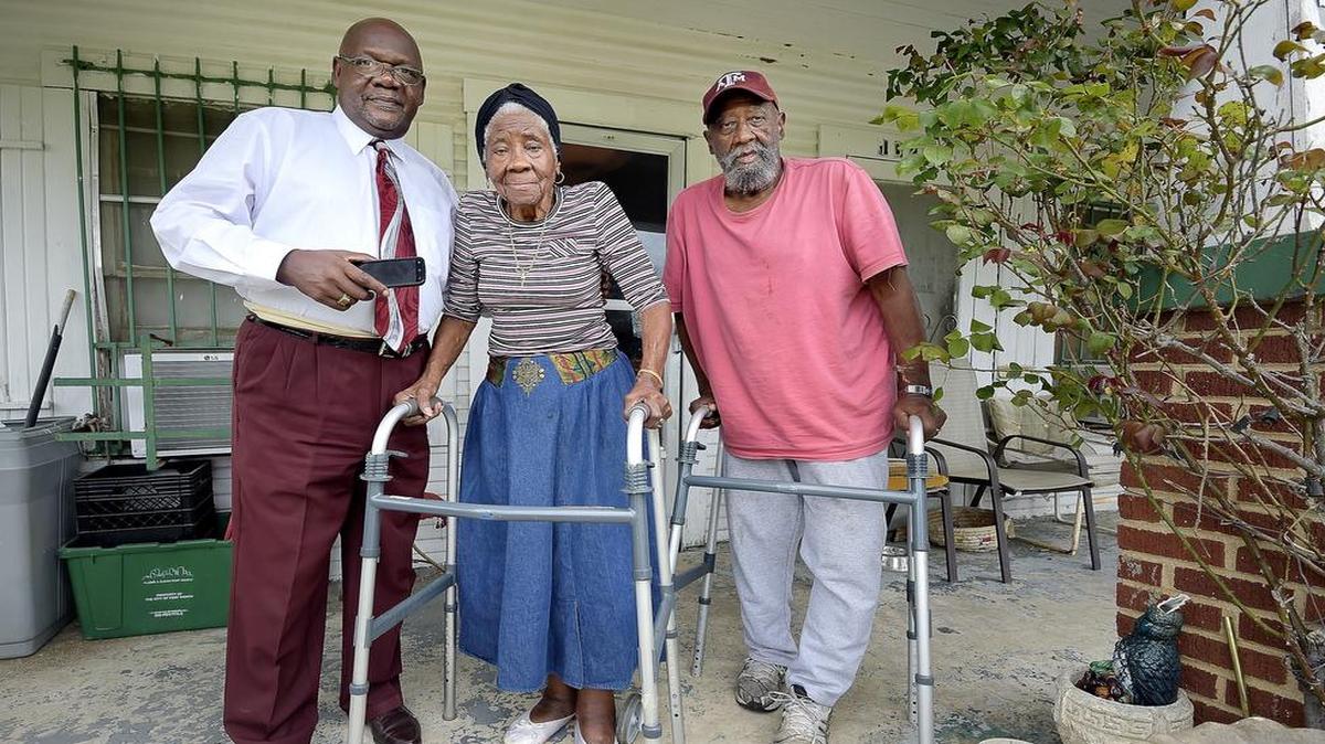 From left, Kenneth Finley, Jeanette Adams and Early Adams, the cousin and mother and father of Craigory Adams, who was shot and wounded by a Fort Worth officer last June.