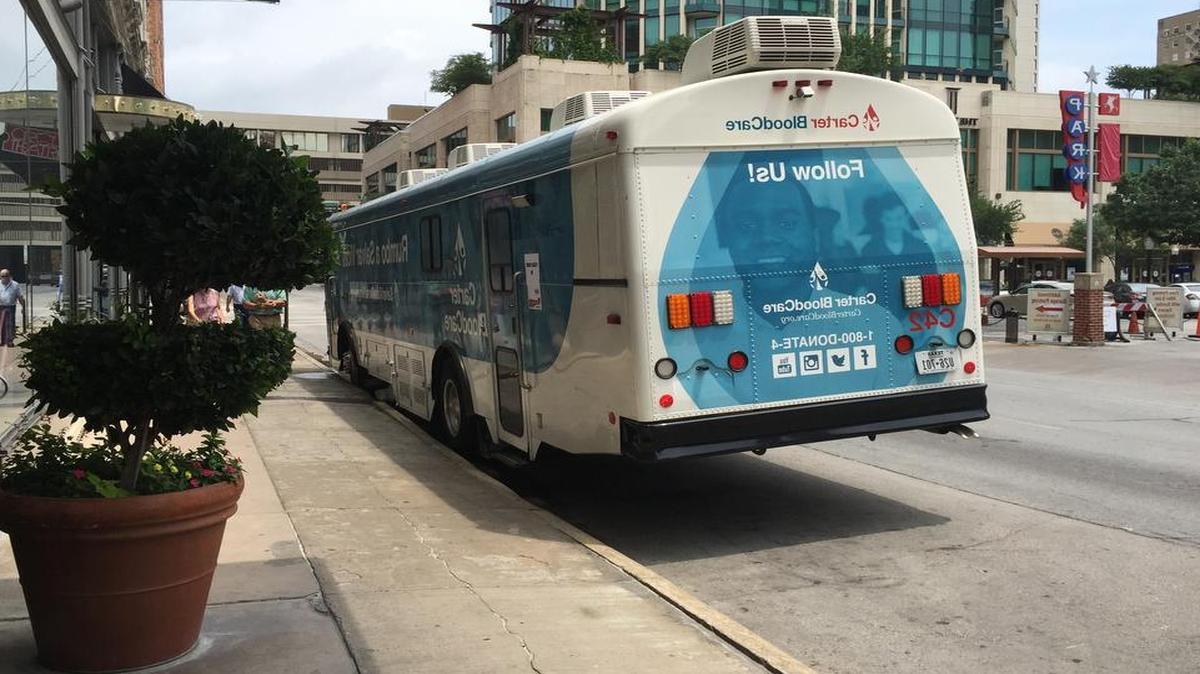 Carter Blood Care mobile unit parked in the 200 block of West Fourth Street on Monday.
