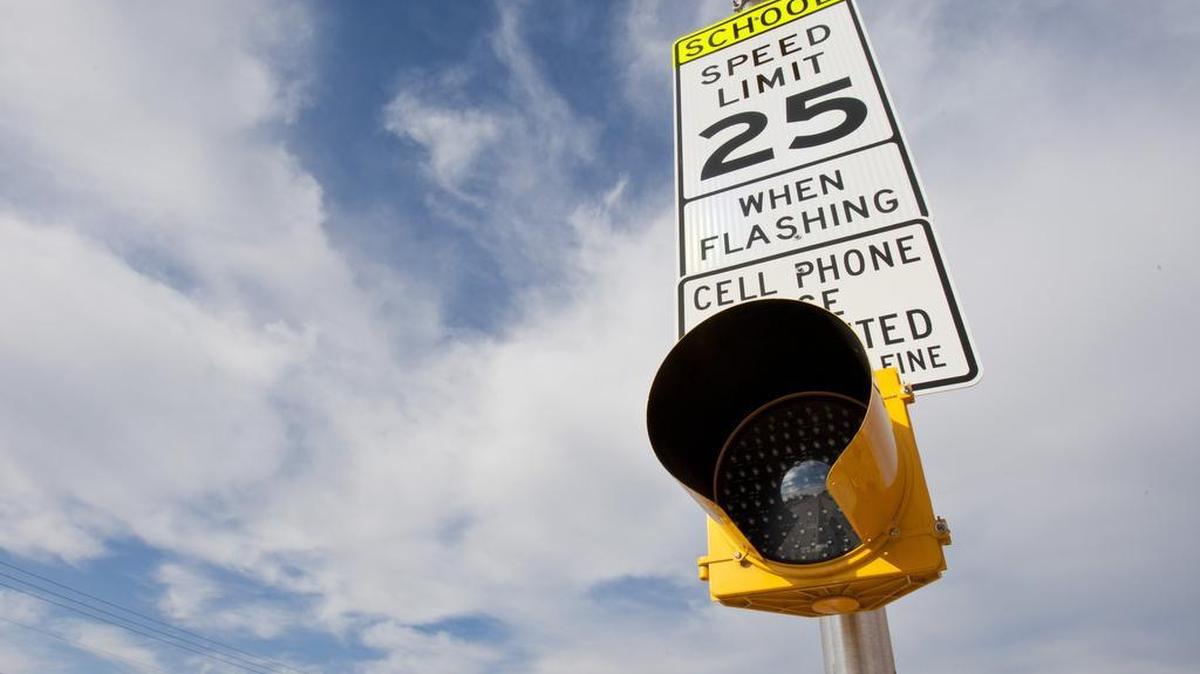 A school zone light near Timber Creek High School in far north Fort Worth. Most area schools start classes Monday.