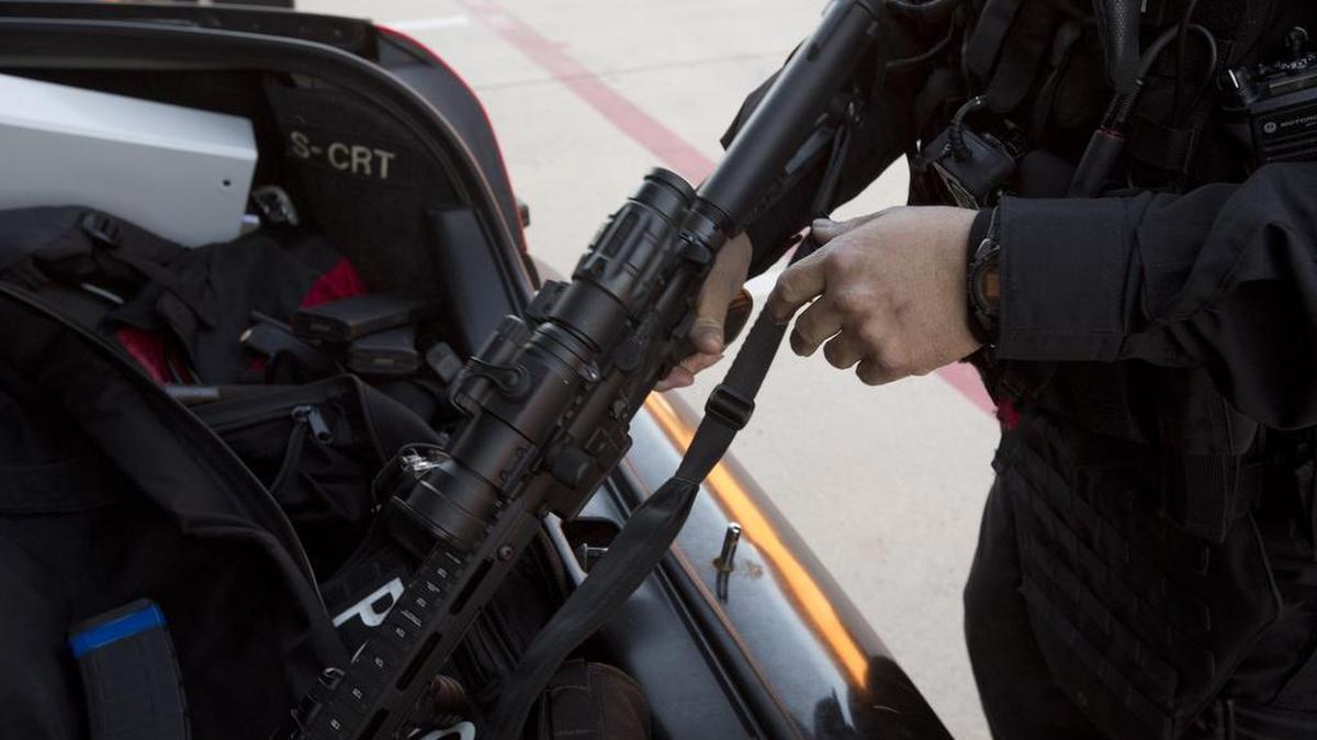 Members of the Fort Worth Police Department zero tolerance unit prepare for a training exercise involving “active shooters” Thursday at the Bob Bolen Public Safety Complex.