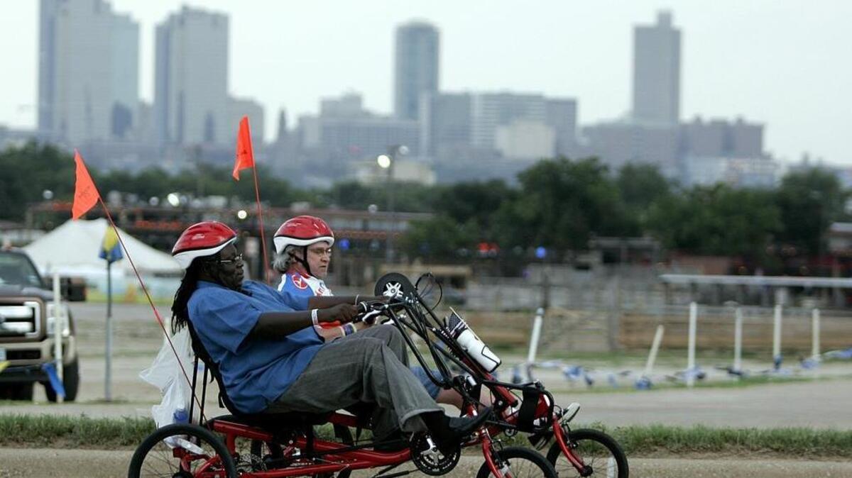 AmTryke riders pass in front of the Fort Worth skyline during the Veterans Ride around the Stock Yard charity event in this file photo.