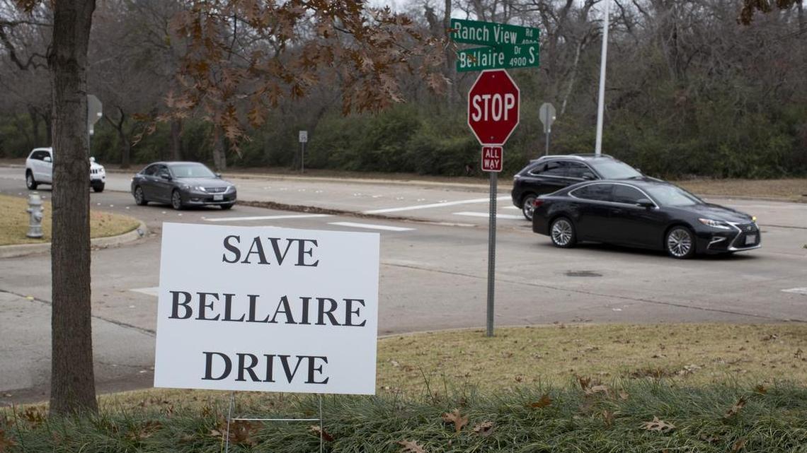 “Save Bellaire Drive” signs are up in Overton Woods in southwest Fort Worth. Some residents are upset about the plan to reduce the street to one lane of traffic in each direction.