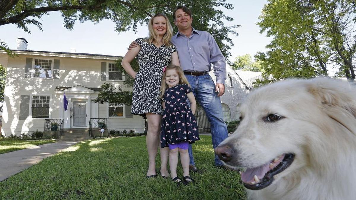 Becky, Matthew and daughter Clara Fetty (in front of their home with dog Dozer) live near a “stealth dorm” home being built on Rogers Ave near the TCU Campus, Saturday, May 13, 2017.