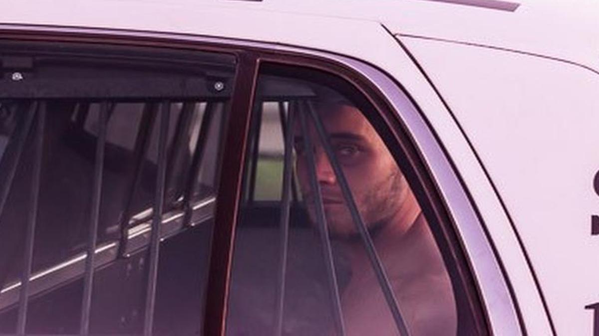 Ed McIver Jr. was arrested after a manhunt following after his father shot a Fort Worth police officer.