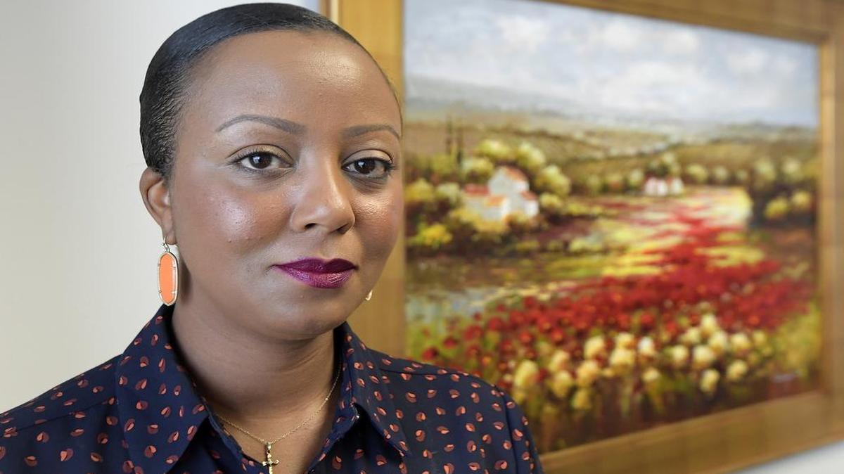 Coneisha Sherrod at attorney Brian Sanford’s office in Dallas. Sanford is representing Sherrod, former vice president of United Way, who has sued the charity on the basis of racial discrimination and retaliation.