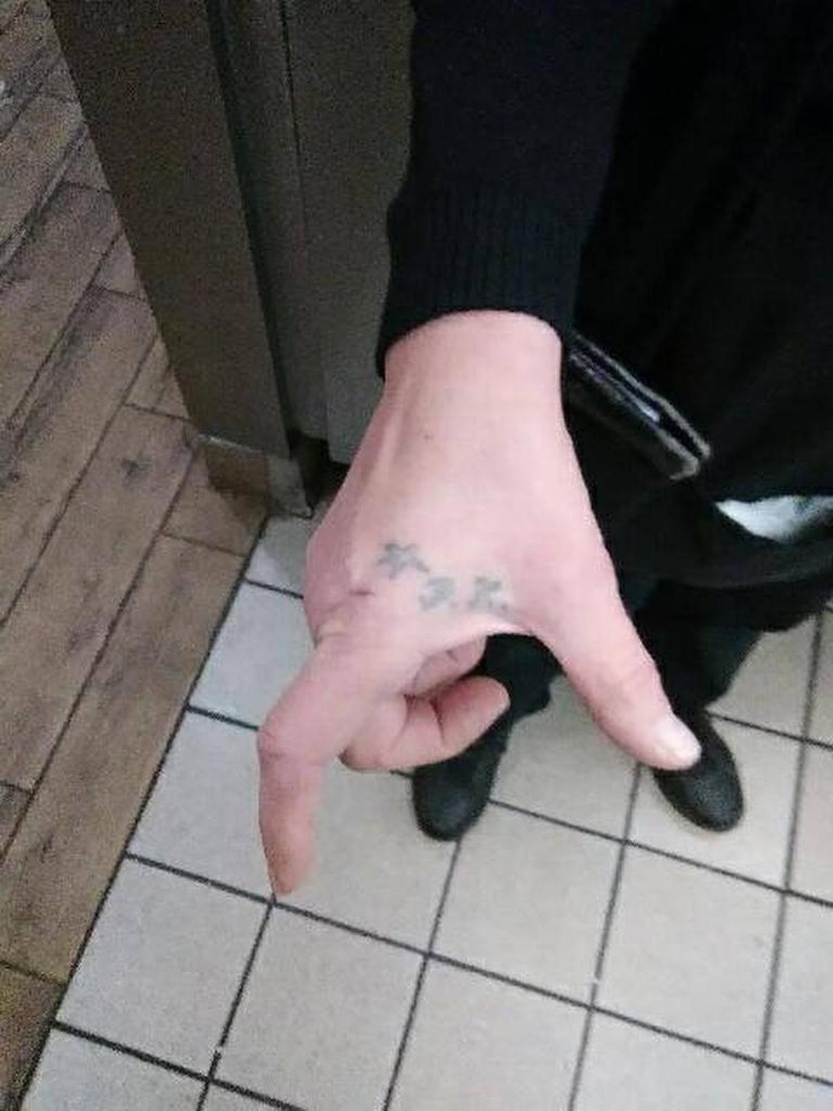 Cindy Springfield claims her ex-husband, Barry Kelly, tattooed his initials on her hand at gunpoint during their short-lived marriage.