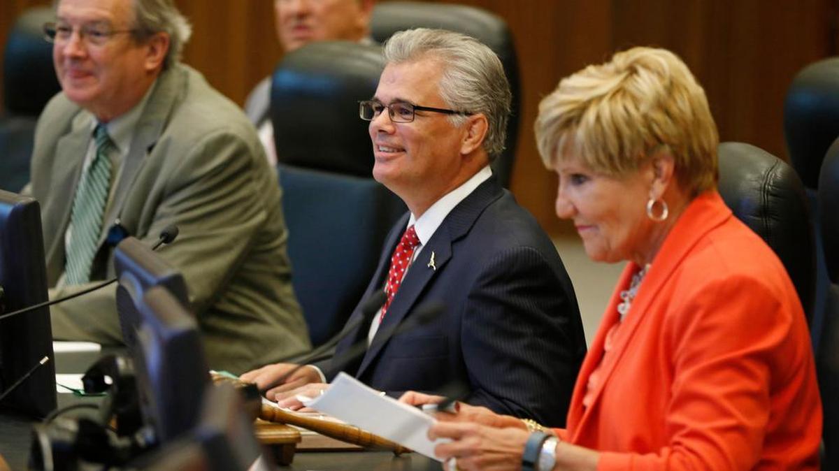 Fort Worth City Manager David Cooke, center, wants to hire a crisis communications management consultant.