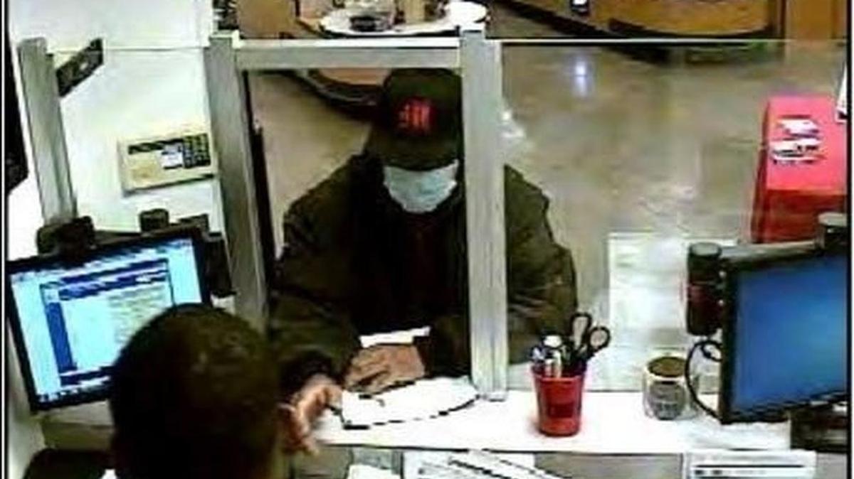Suspect photo from a bank robbery at a First Convenience branch in March.