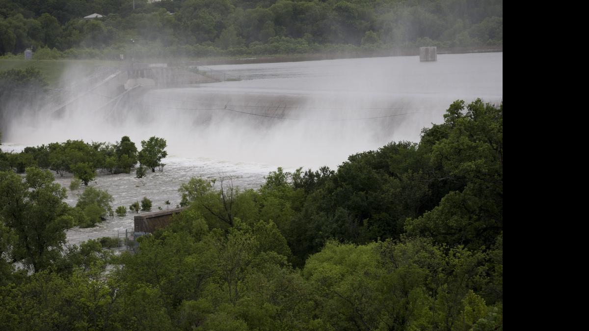 
Water has been overflowing at many lakes, including the dam at Lake Worth on Sunday.
