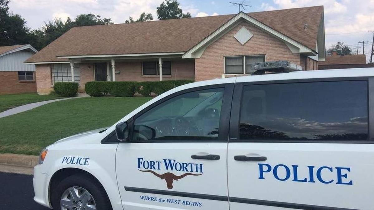 A Fort Worth police crime scene vehicle is parked outside the house in the 6900 block of Heritage Lane where Margaret Shelton, 85, was found dead on Aug. 31.