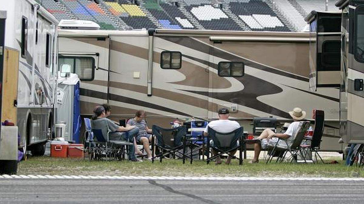 
Three motorhomes are set up in a U-shape with campers from Las Vegas, Texas, Montana and Louisiana in the campgrounds at Texas Motor Speedway Thursday morning.
