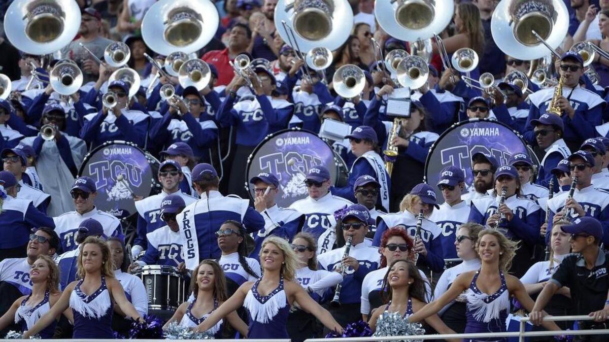 The TCU marching band at a football game in 2015. Since implementing an incentive program that year, the university’s band has grown by nearly 100 members.