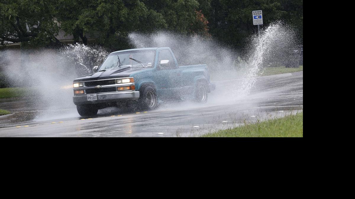 
Rain runoff created large puddles in the Westcliff neighborhood of Fort Worth on Wednesday. More rain is expected Saturday and Sunday.
