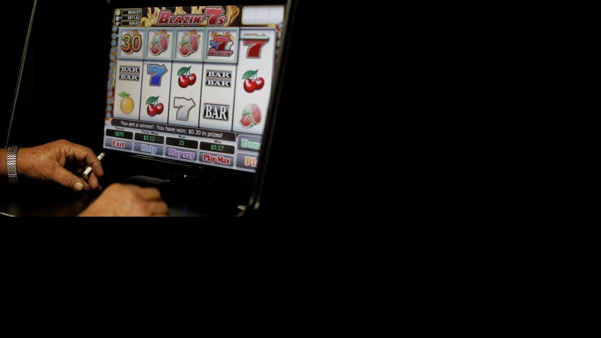 
A player uses a sweepstakes machine, a game of chance machine similar to eight-liners.
