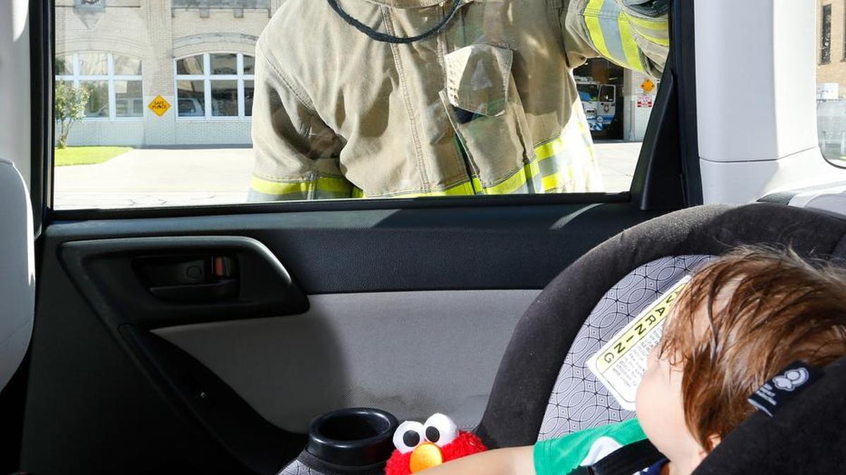 Don't let a firefighter or other first responder be the last person to see your child alive. Firefighter Josh Larkin and Michael Pinckney in a photo illustration of a child left in a hot car.