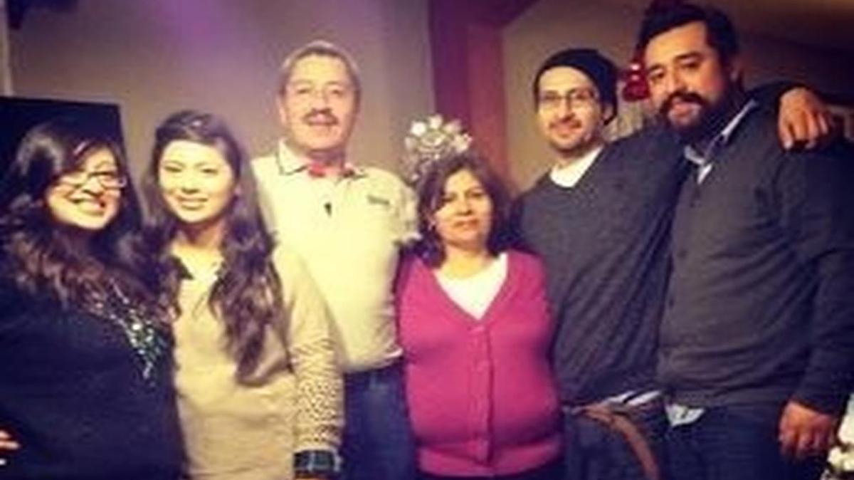 Maria Patino Cortez, center in pink, with her husband and four children.