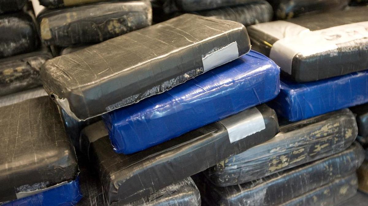 Federal prosecutors displayed piles of seized drugs in 2008 when announcing the arrest of 22 members of cocaine and methamphetamine trafficking cells associated with Mexico's Gulf Cartel.