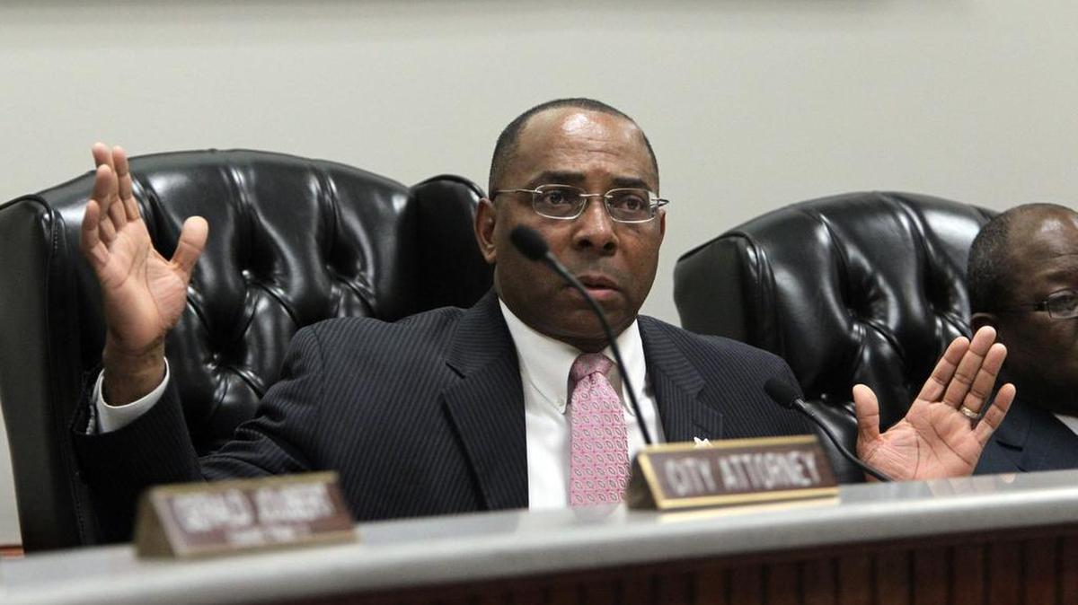 Forest Hill Mayor James Gosey reacts to what he perceives as an audience member’s threatening posture during a special City Council meeting on Dec. 9, 2010. At the meeting, the council voted to suspend Gosey for four months.