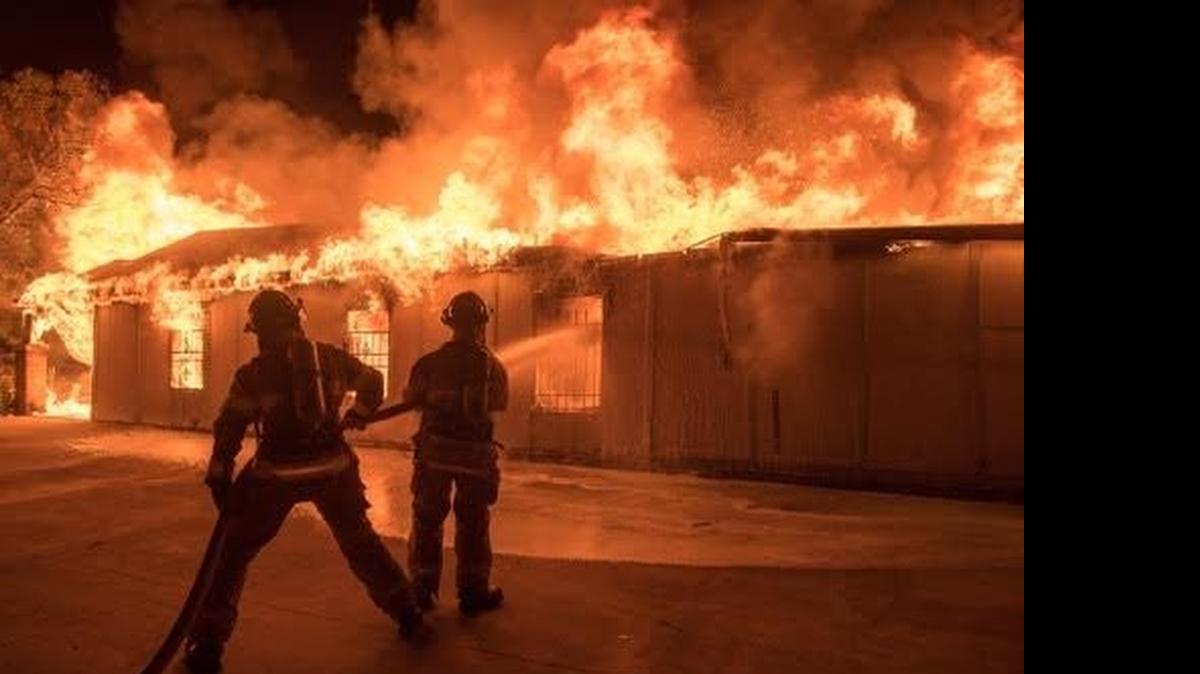 
Fort Worth firefighters battle the church blaze early Tuesday. Two other nearby buildings burned Monday and early Tuesday. Investigators are trying to determine whether an arsonist set the fires.
