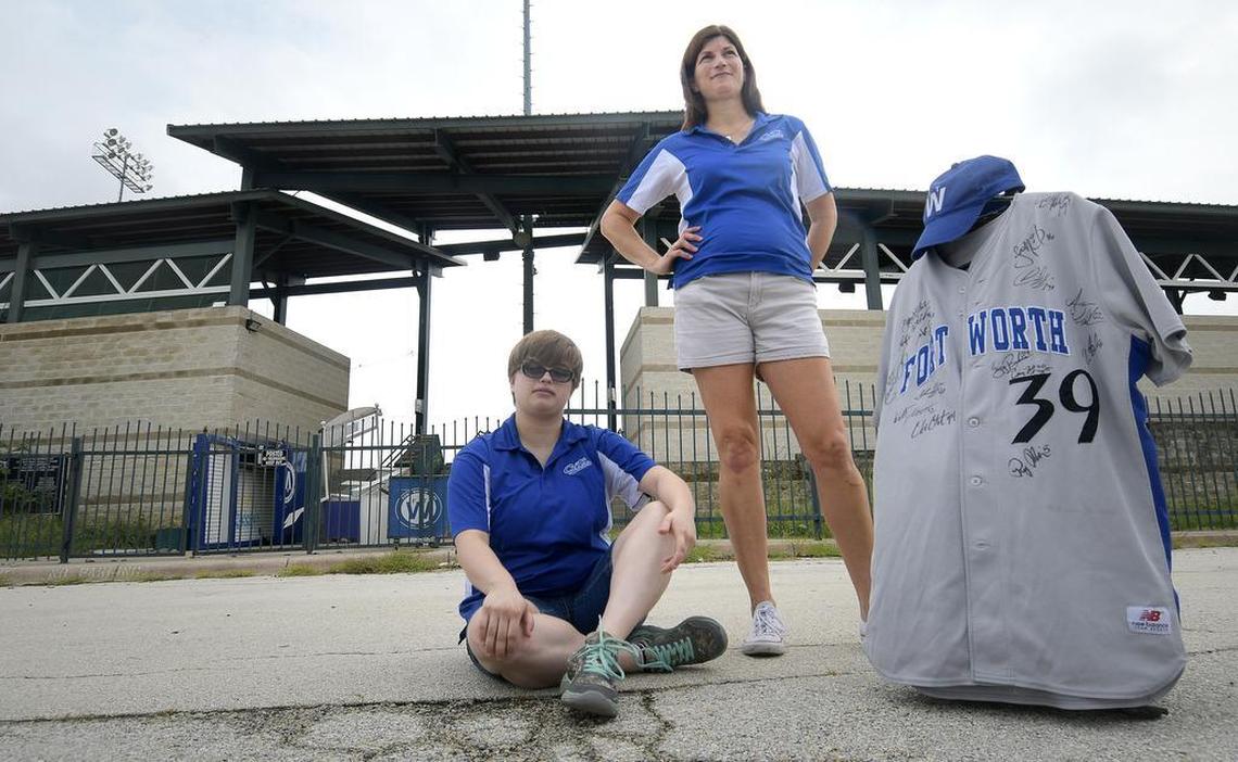 Hayden Clark, left, and Stella Ballard pose outside of LaGrave Field former home of Fort Worth Cats.