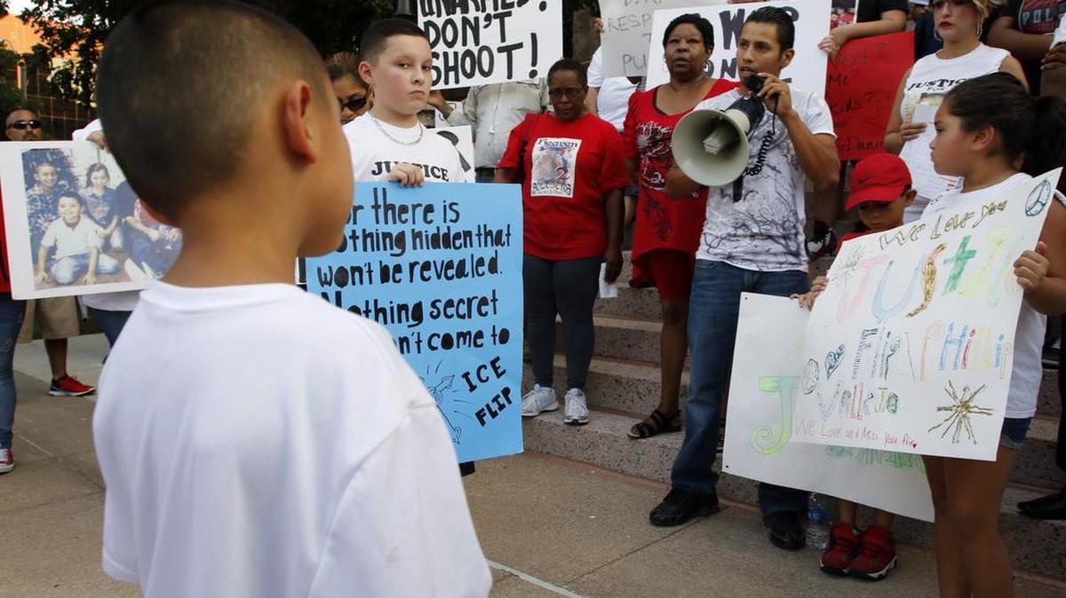 
Fernando Romero, with bullhorn, says, “Every time I see a cop, I want to stop and film him.” Romero is the brother-in-law of Rubén García Villalpando, 31, of North Richland Hills, whose death got national attention after a Grapevine officer shot him on Feb. 20 on the side of Texas 121 in Euless. 

