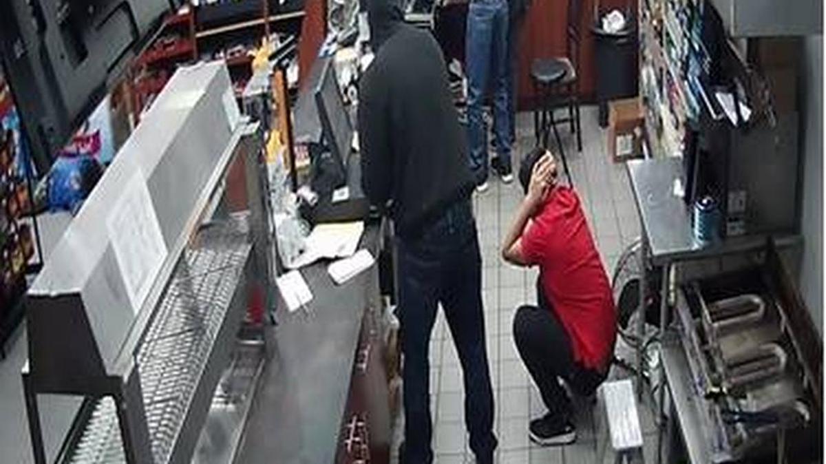 Fort Worth police released this security camera photo of two robbers at a convenience store but did not provide the name or location of the store or the date.
