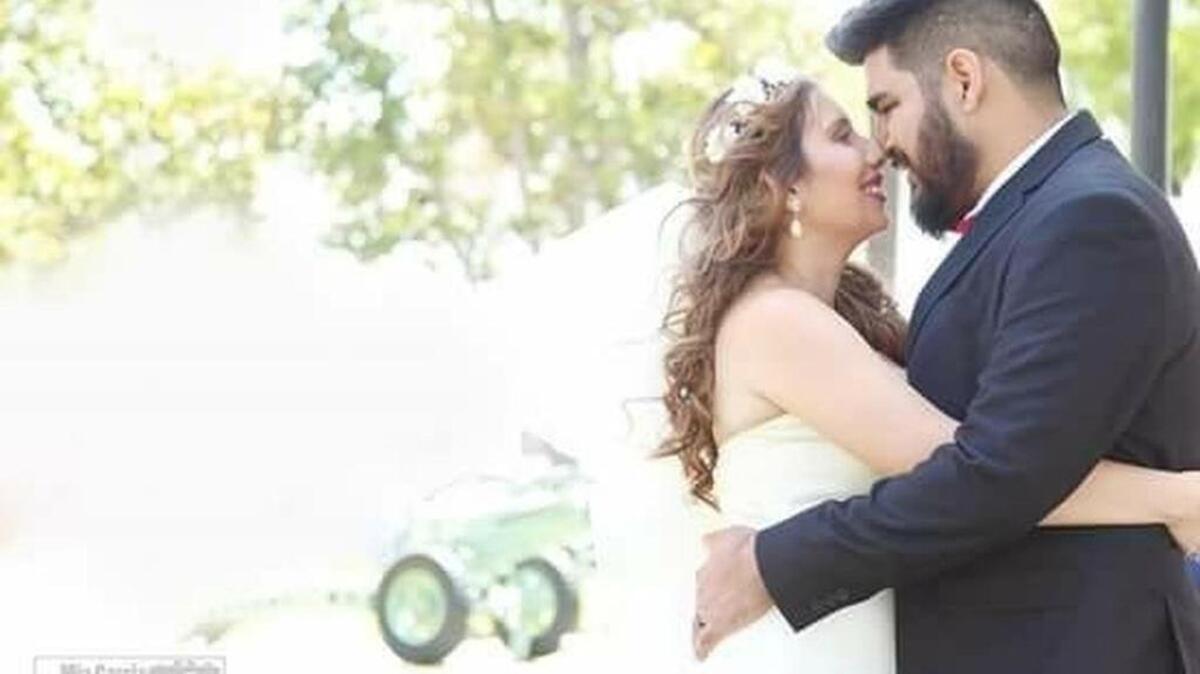 Jackie and Raymond Huerta on their wedding day. Raymond Huerta was killed Jan. 11 trying to protect his wife during a robbery at the store where she worked.