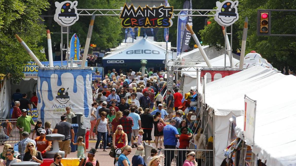 Crowds fill the street Friday afternoon at the Main St. Fort Worth Arts Festival. The festival continues through Sunday, weather permitting.