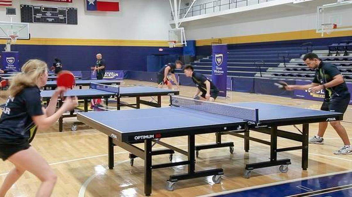 
Team members Anastatia Rybka and Emil Santos practice at the Sid Richardson Center gym at Texas Wesleyan University. Santos, a sophomore from Dominican Republic, won the singles competition two years ago.
