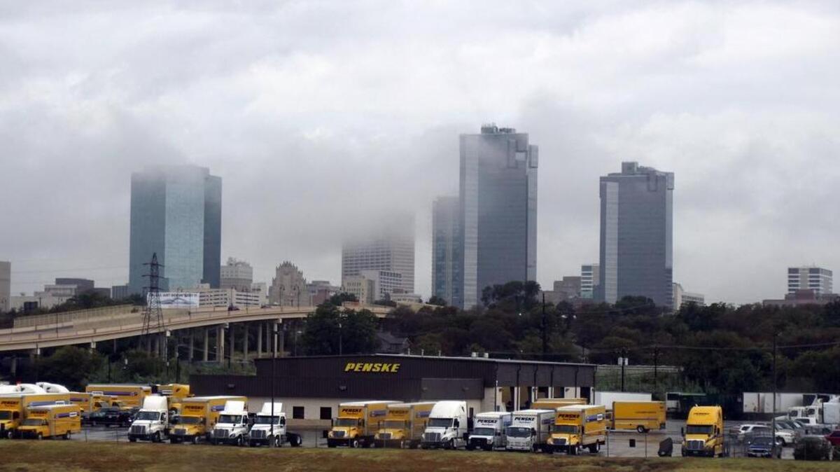 
Scud clouds blow through downtown Fort Worth after a cold front brought rain overnight and early Wednesday.
