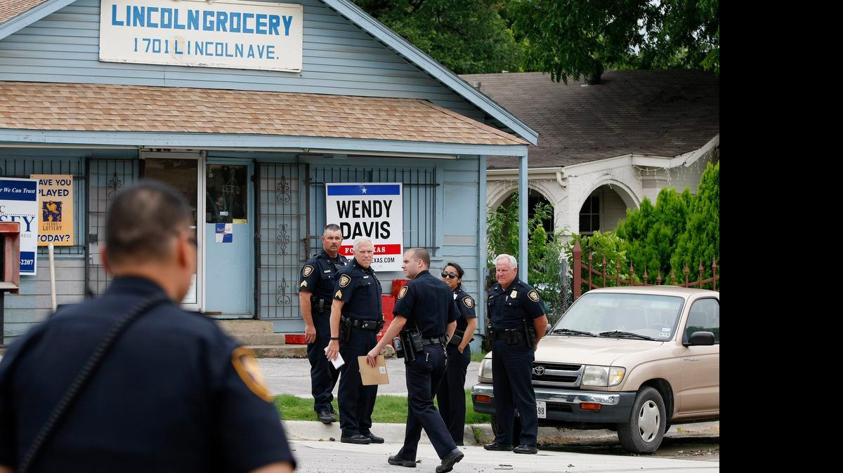 
Police investigate at a north Fort Worth store where the owner fatally shot a man during an attempted armed robbery on Wednesday, June 17, 2015.
