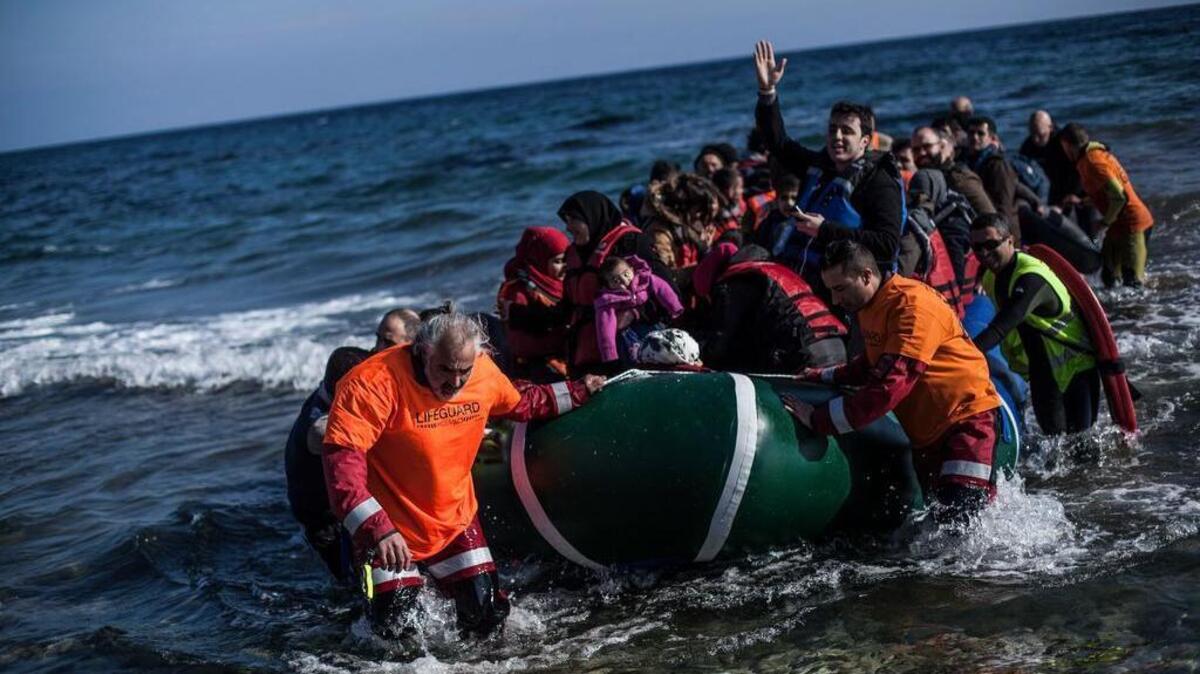 Syrian refugees aboard a dinghy arrived at the Greek northeastern island of Lesbos in February.