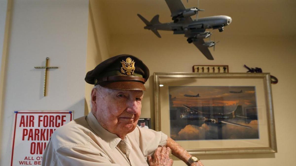 
Fiske Hanley, 95, displays his World War II memorabilia in his Trinity Terrace apartment in Fort Worth. He was a flight engineer on a B-29 Superfortress.
