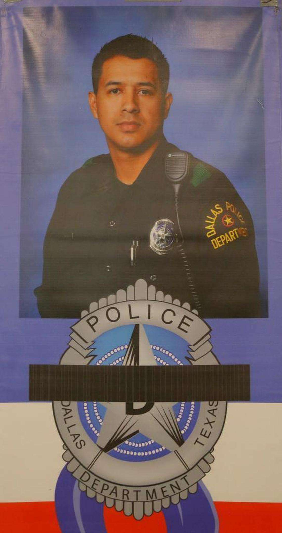 Patrick Zamarripa’s official police portrait was on view as Paschal High School’s alumni association awarded scholarships in his honor in May.