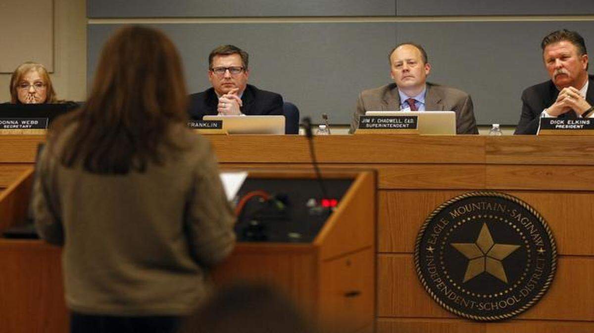 
Eagle Mountain Saginaw school trustees hear remarks Monday night, March 2, 2015, from a supporter of an assistant principal at Comanche Trail Elementary School. The school’s principal has been reassigned.
