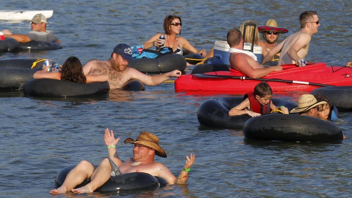 
Tubers floated in the Trinity River near Panther Island Pavilion at a Rockin’ the River event in June 2014. 

