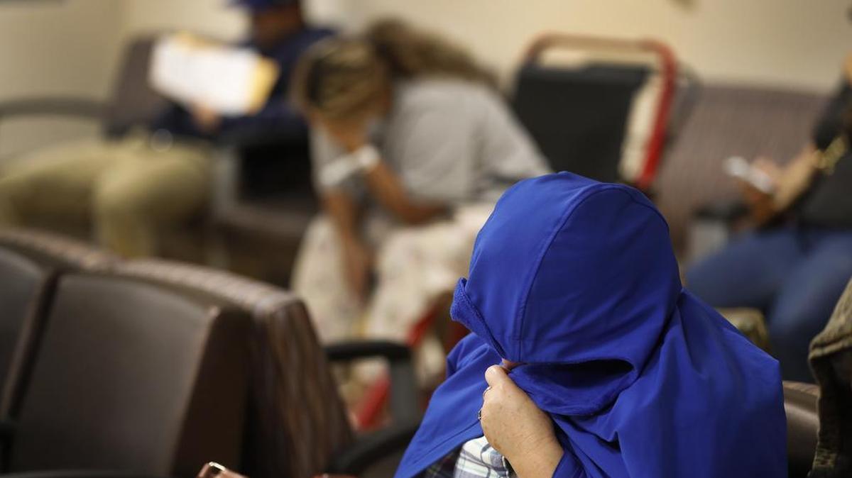 Patients wait in the emergency department at St. Joseph's Hospital in Orange, Calif.