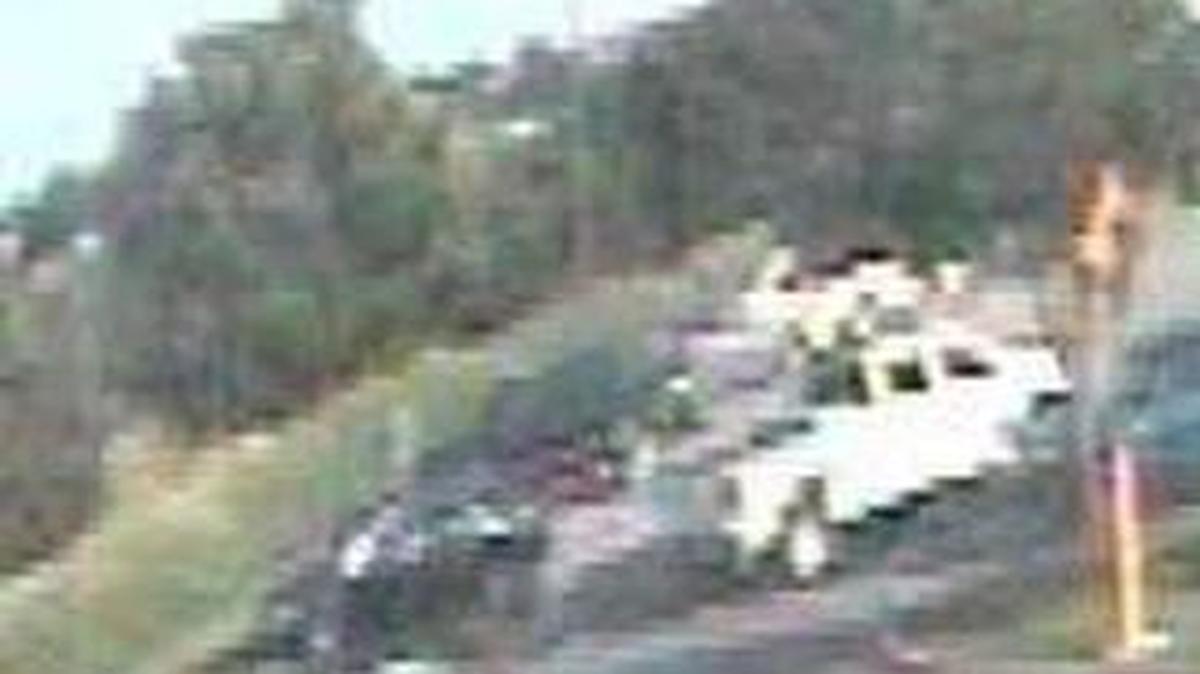 
Fort Worth police are looking for the black car at front left in this photo taken by a Wal-Mart security camera on June 12. 
